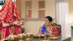 Emily Serves Food to Jaibala