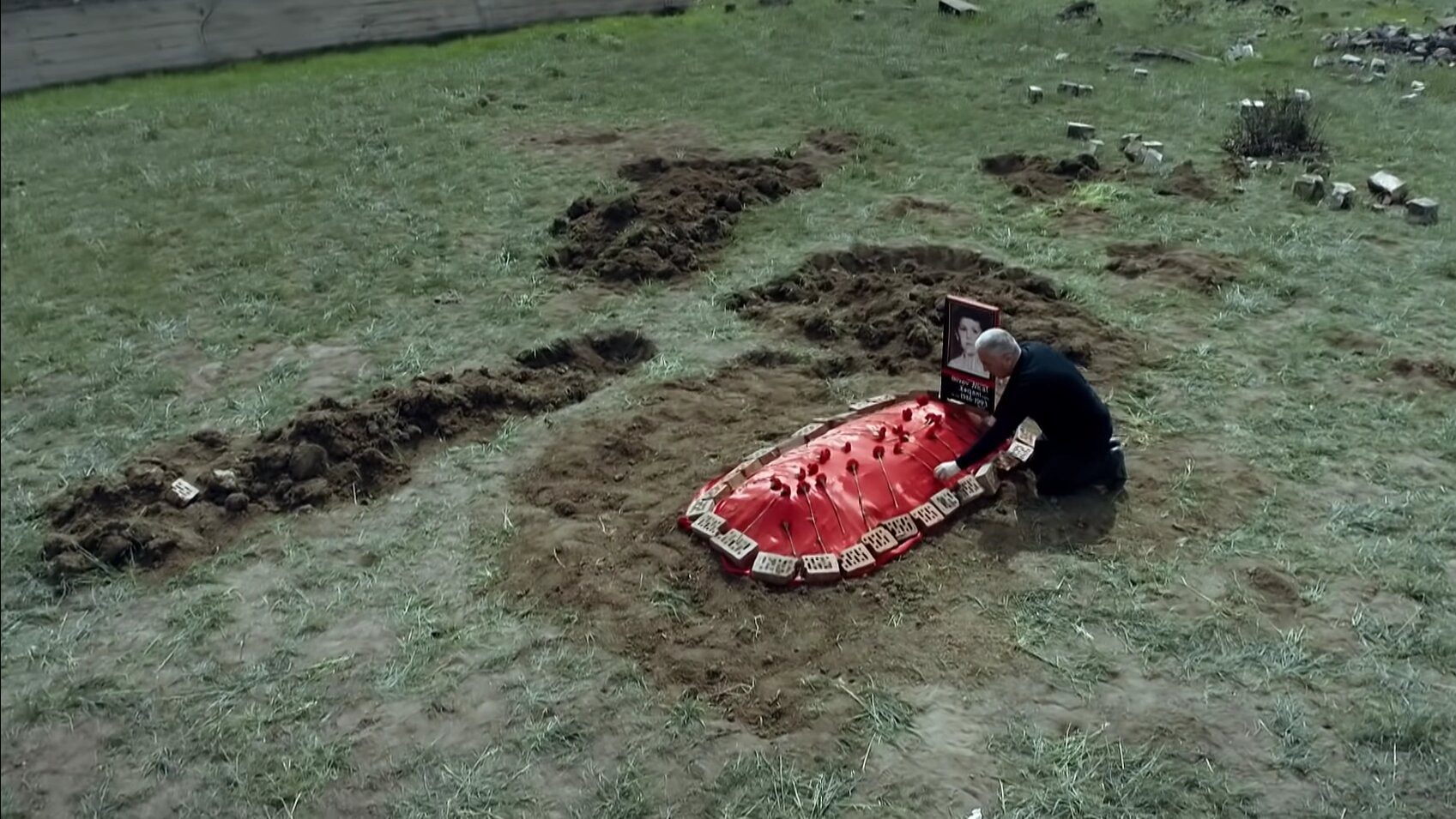 The grave under the plum tree