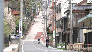 Journeys Up and Down a Steep Road in Tokyo